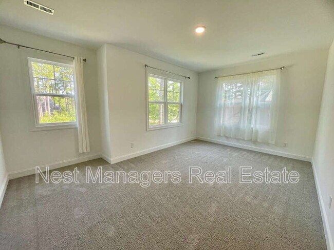 Building Photo - 36 Micahs Way N