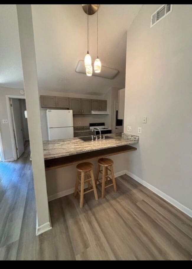 Building Photo - Affordable Living with Comfort & Convenience