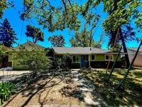 Building Photo - Freshly Renovated 3 Bedroom Home with Large Fenced Yard & Double Garage