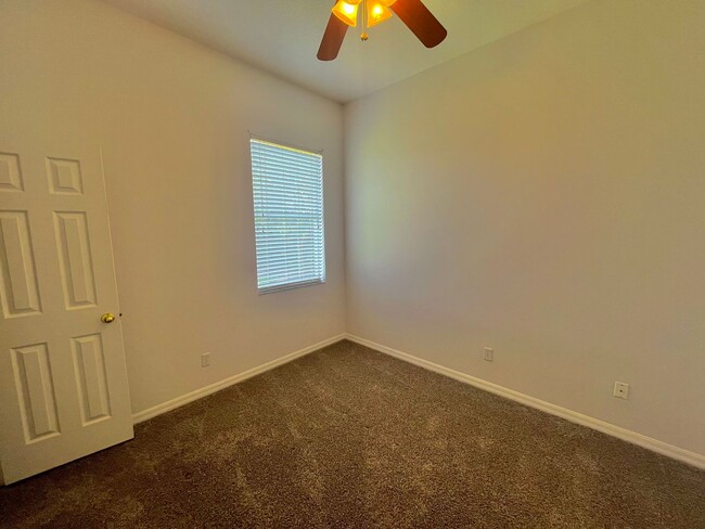 Building Photo - Spacious 4-Bed, 3-Bath Home in Guard-Gated...
