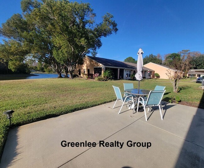 Building Photo - Fully furnished waterfront 55+ rental with beautiful updates, great amenities, and all utilities ...