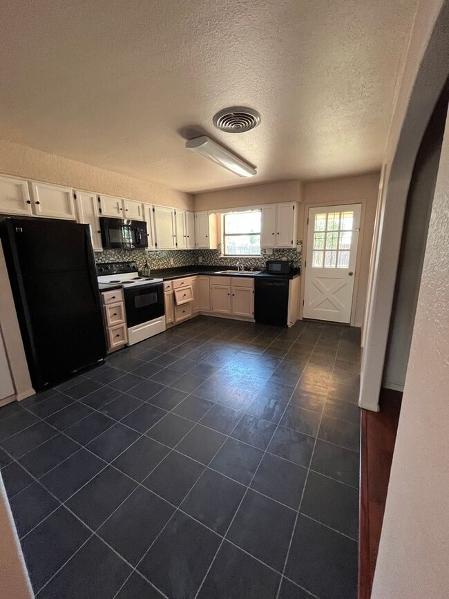 Building Photo - Freshened with upgrades and ready for new ...