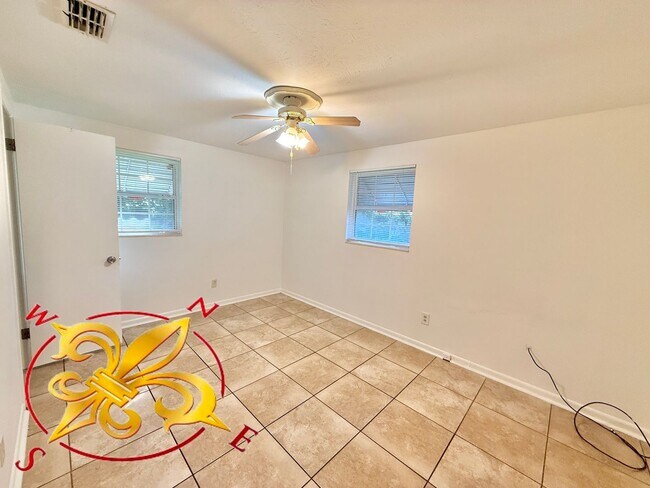 Building Photo - Spacious 4-Bedroom Home with Dual Living A...