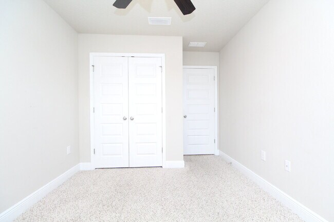 Building Photo - Spacious 3-Bed, 2.5-Bath Townhome Steps from Blue Wahoos Stadium & Palafox Street with Upgraded K...