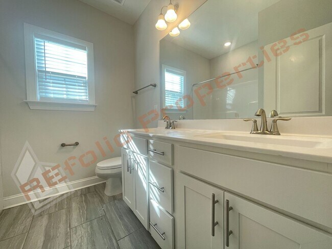 Building Photo - Beautiful 5 Bedroom 2-Car Garage Home with...