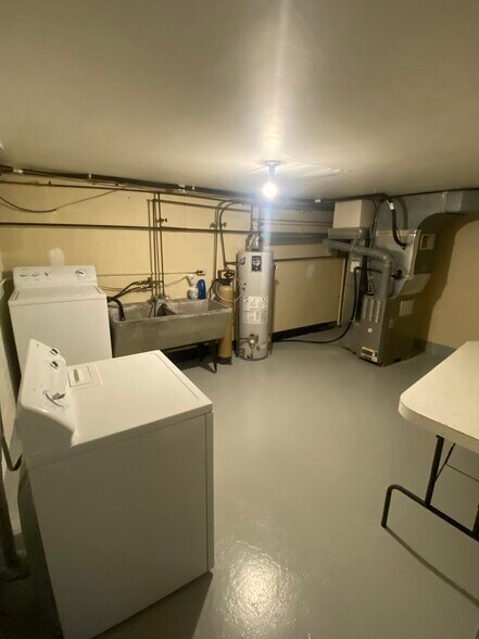 Large laundry/utility room lower level - 246 S Prospect St