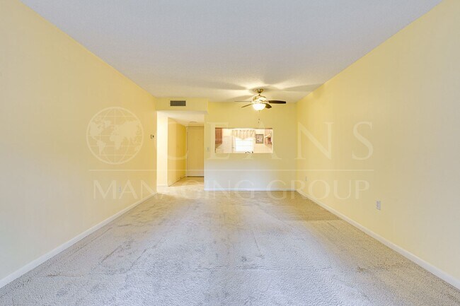 Building Photo - Spacious Condo with utilities included! Lo...