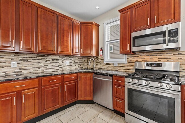 Building Photo - 6BR / 5BA Single-Family Home | 2,663 Sq Ft | Private Driveway | Deck | $4,200/mo Spacious 6-bedro...