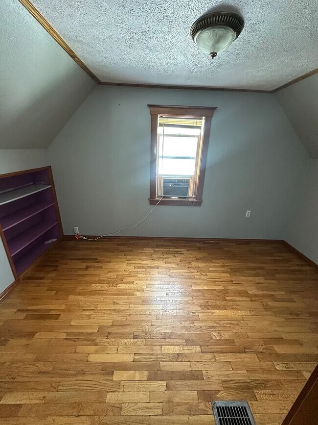 Building Photo - Ideally Located and Updated 4 Bed 2 Bath Fully-Fenced Home w/ Detached Garage/Shop!