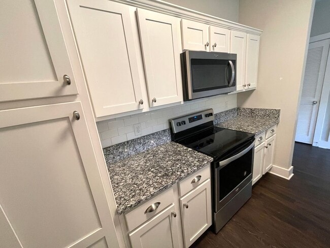 Building Photo - Beautiful Condo! Views & Nature from Every Window! Pet Friendly! Required Insurance & Air Filters...