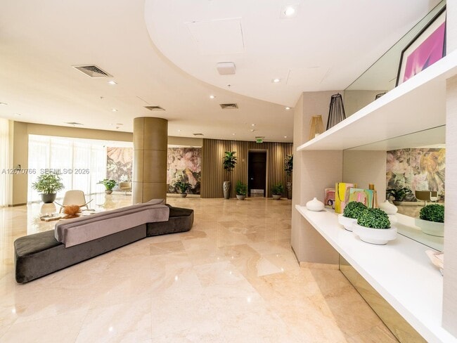 Building Photo - 10275 Collins Ave