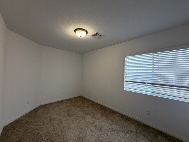 Building Photo - 7869 Tyrell Peaks St