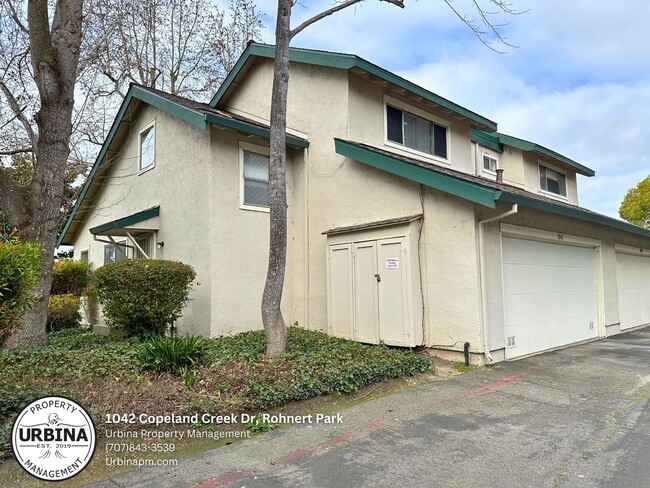 Primary Photo - Charming 2-Bed, 1.5-Bath End-Unit Condo in...