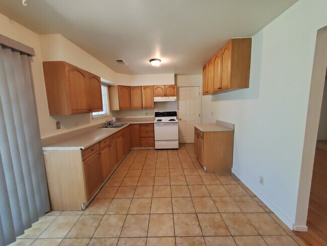 Building Photo - Price Reduced! 3 Bedroom 2 Bath House with Large Yard Available Now!