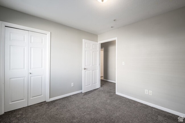 Building Photo - Spacious 3-bedroom top level condo is a mu...