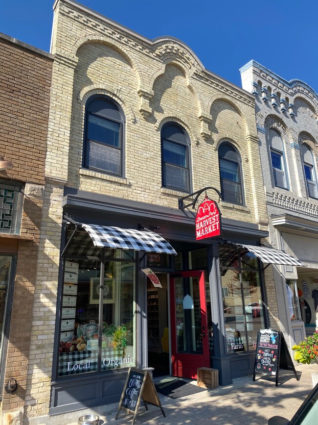 Historic restored 1854 building, unit above DreamPort Harvest Market! - 225 N Franklin St