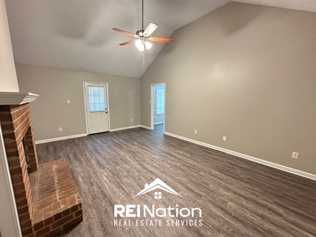 Building Photo - CORDOVA COVE CHARMER! 3BR/2BA | High Ceilings & Brick Fireplace | 2-Car Garage!