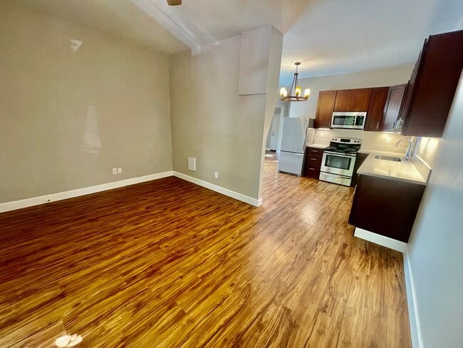 Building Photo - Prime Location! Modern 2BD/1 BA with A/C & EV Charging Steps from Mississippi