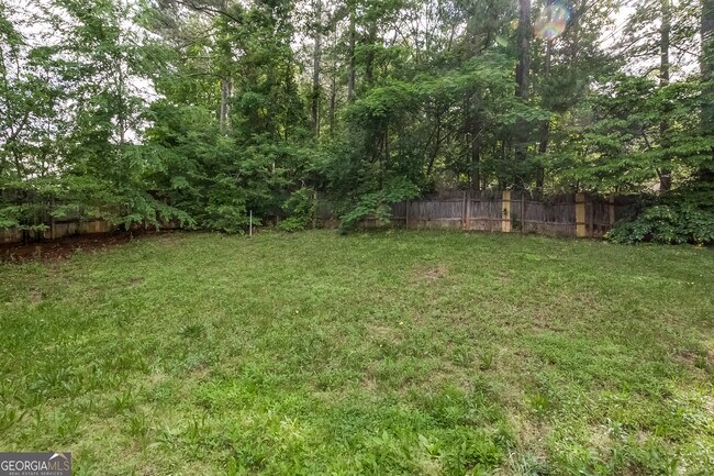 Building Photo - 8560 Glenwoods Dr