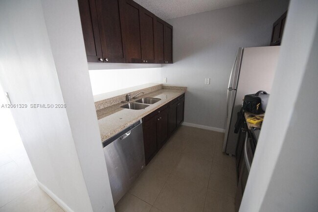 Building Photo - 8550 N Sherman Cir