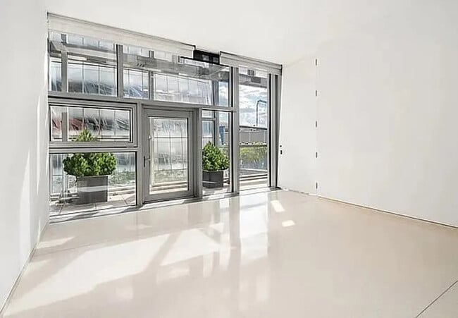 Building Photo - 100 11th Ave