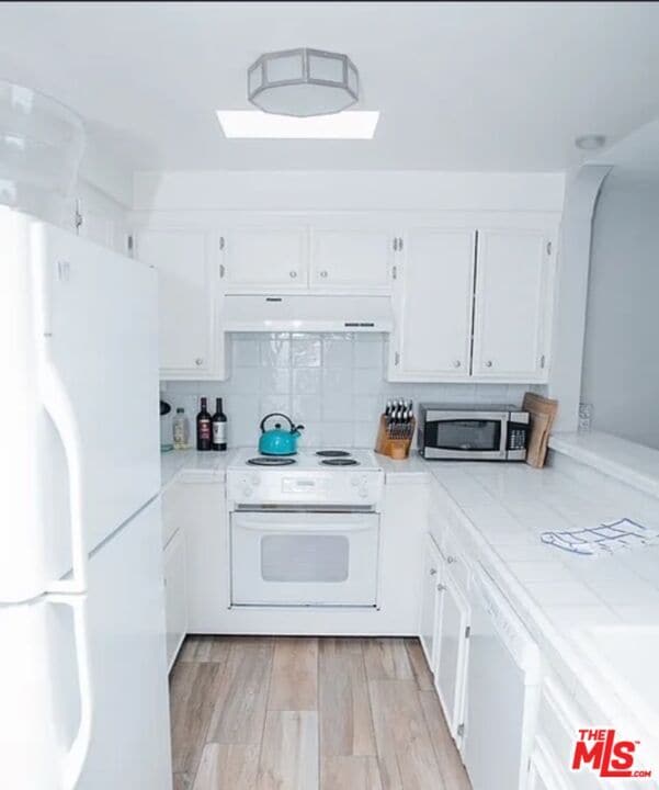 Building Photo - 6400 Pacific Ave