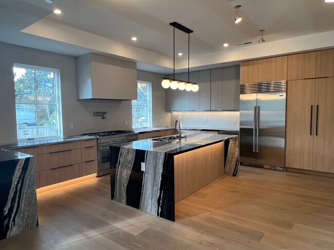 Building Photo - Stunning new build, top of the line everything, walk to town location, close to schools! INCLUDES...