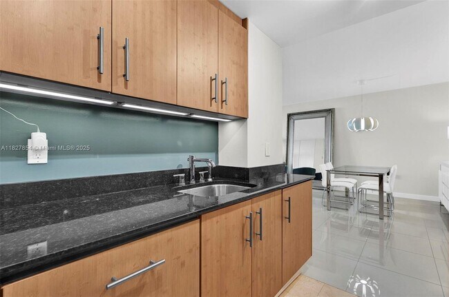 Building Photo - 10275 Collins Ave