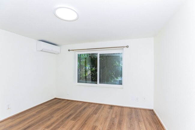 Building Photo - Kahala Avenue Beachside - remodeled 2 bedroom, 1 bath with Luxury Vinyl Plank Flooring