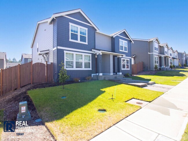 Building Photo - Brand-New 3BR Town Home Near JBLM | Bonus Loft, 2-Car Garage & Modern Finishes