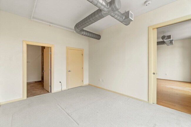 Building Photo - Madrigal Lofts in Mt Vernon Triangle | 2 Bed | 2 Bath | 920 Sf | Balcony | 1 Garage Parking Space