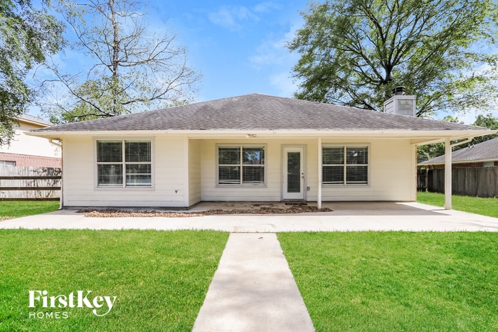 Building Photo - 7122 Woodland Oaks