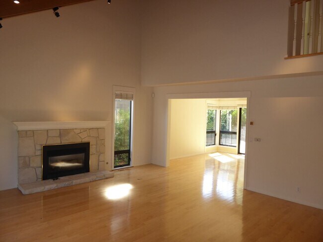 Building Photo - SPACIOUS FOUR BEDROOM / THREE AND HALF BAT...