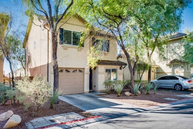 Building Photo - Very nice kept two-story 3 bedroom 2 bath house in a small gated community on the east side