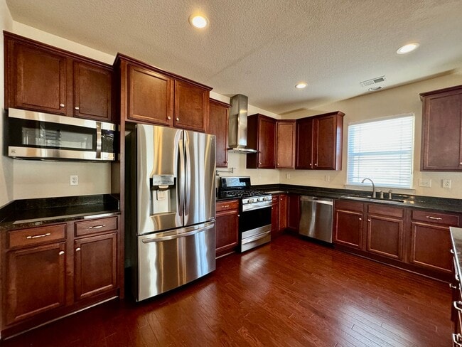Building Photo - 4-Bedroom Home Ready 07-10-26!! Gourmet Kitchen - Fenced Backyard - Pet Friendly!