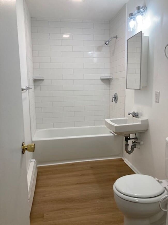 Building Photo - Pet Friendly Renovated Brookline Gem with Laundry in Unit and 1 Parking is a steal!