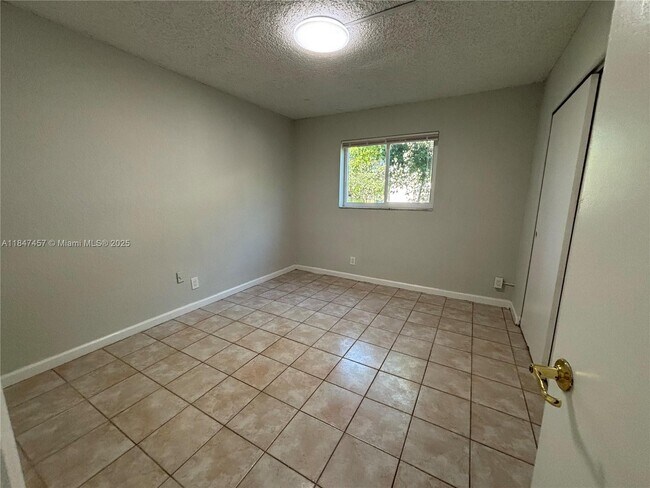 Building Photo - 7921 NW 44th Ct