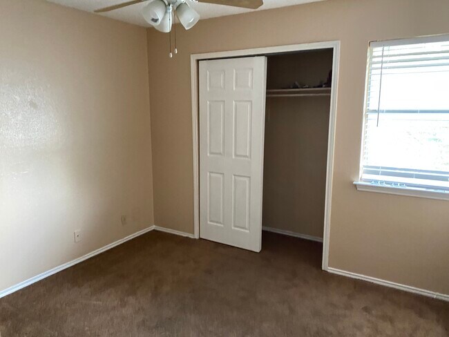 Bedroom 2 & closet - 10661 Starcrest Dr