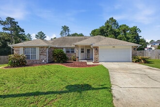 Building Photo - "Charming Pet Friendly 4-Bed Oasis with Granite Touches & Cozy Fireplace in South Crestview!"