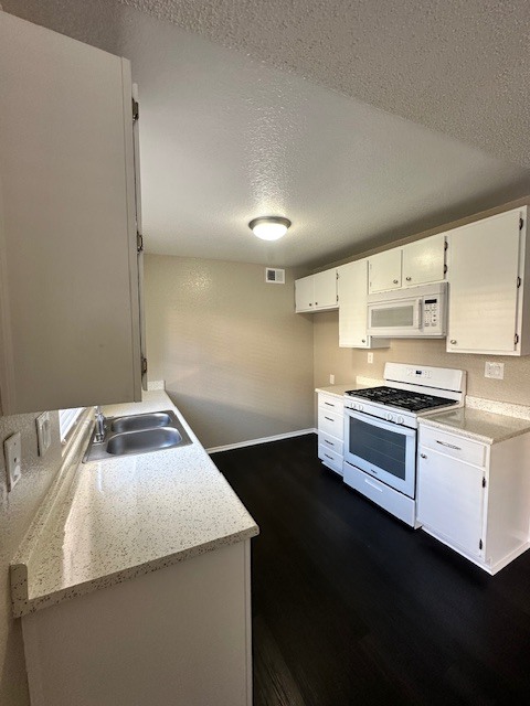 Kitchen. Fridge to be provided upon request - 7385 Lariat Pl
