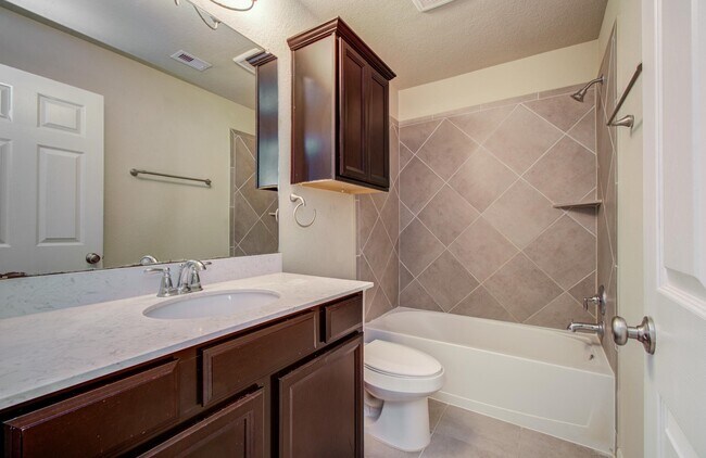 Building Photo - 15618 Whispering Green Dr