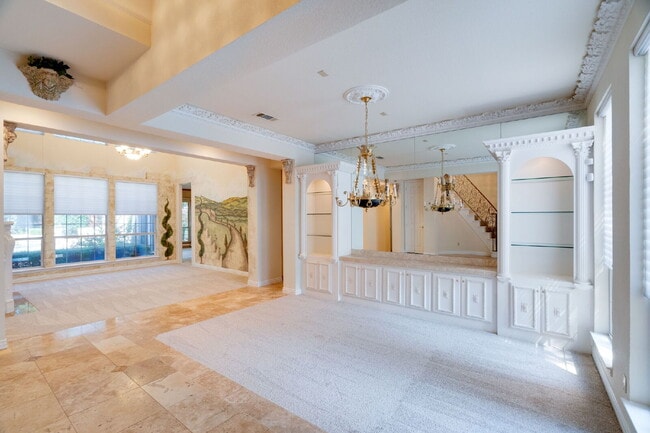 Building Photo - "Stately Gated 5-Bedroom Estate With Pool, Custom Details & Abundant Living Space!"