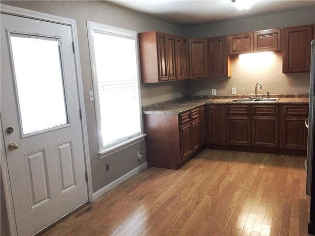 Building Photo - Remodeled 1 story home in Hurst with original plank wood flooring