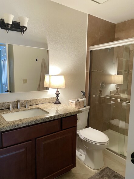 Primary bathroom with walk in shower - 7101 W Beardsley Rd