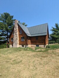 Building Photo - Log Cabin in Pilot Grove, MO