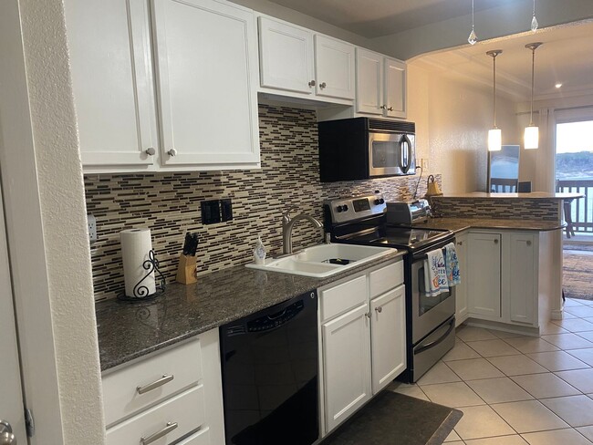 Building Photo - FURNISHED STUDIO CONDO WITH A MILLION DOLLAR LAKE VIEW