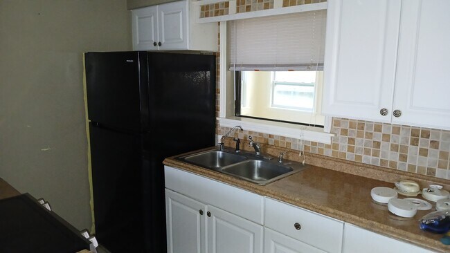 Kitchen Canal view - 211 Sandy Cir