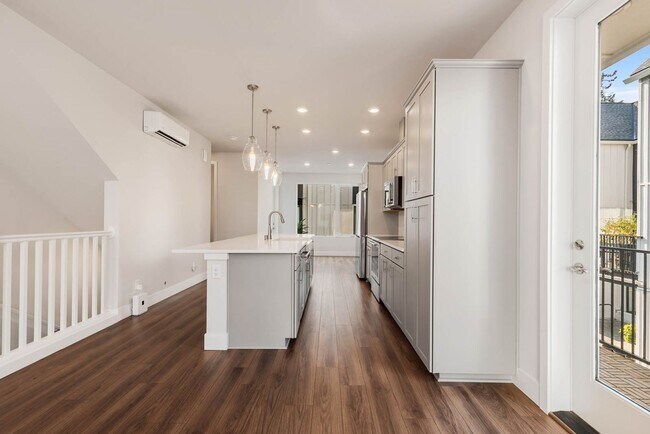 Building Photo - Contemporary Townhome with Attached 2-Car Garage