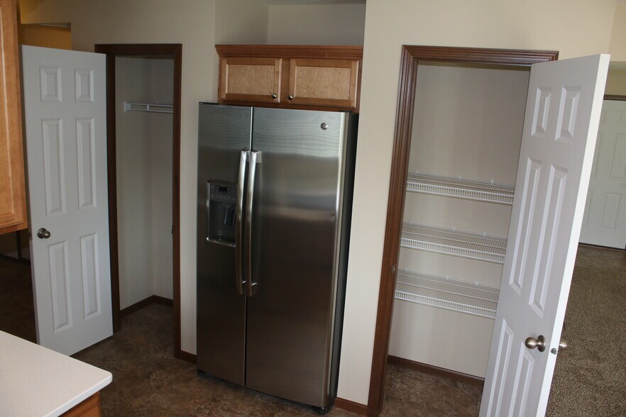 Fridge and pantry - 5178 Foxfield Dr NW