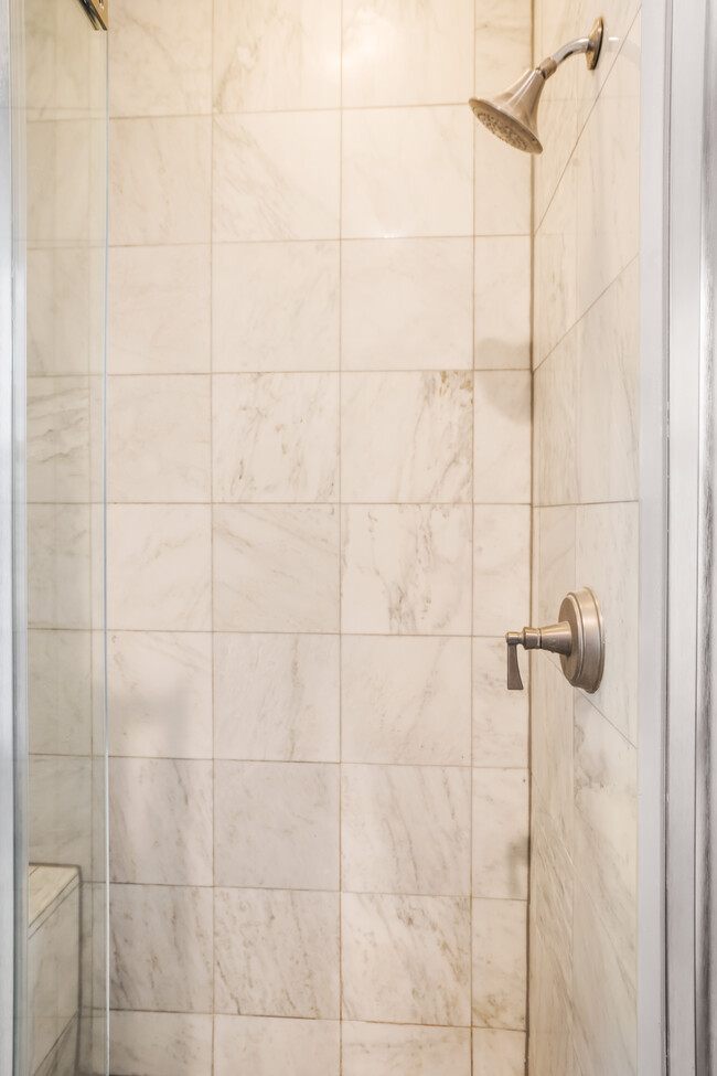 Master bath with walk-in marble shower - 1208 Constitution Ave NE